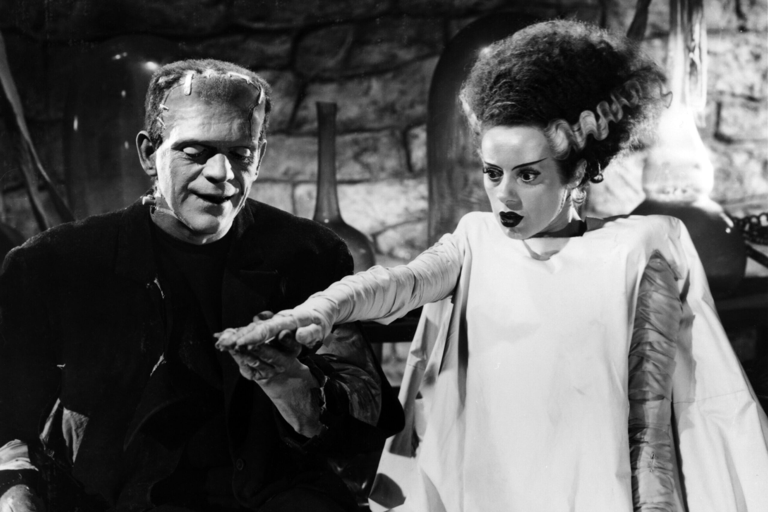 Still from the 1935 film The Bride of Frankenstein of Boris Karloff as Frankenstein's monster and Elsa Lancheste as the Bride pictured from left to right.