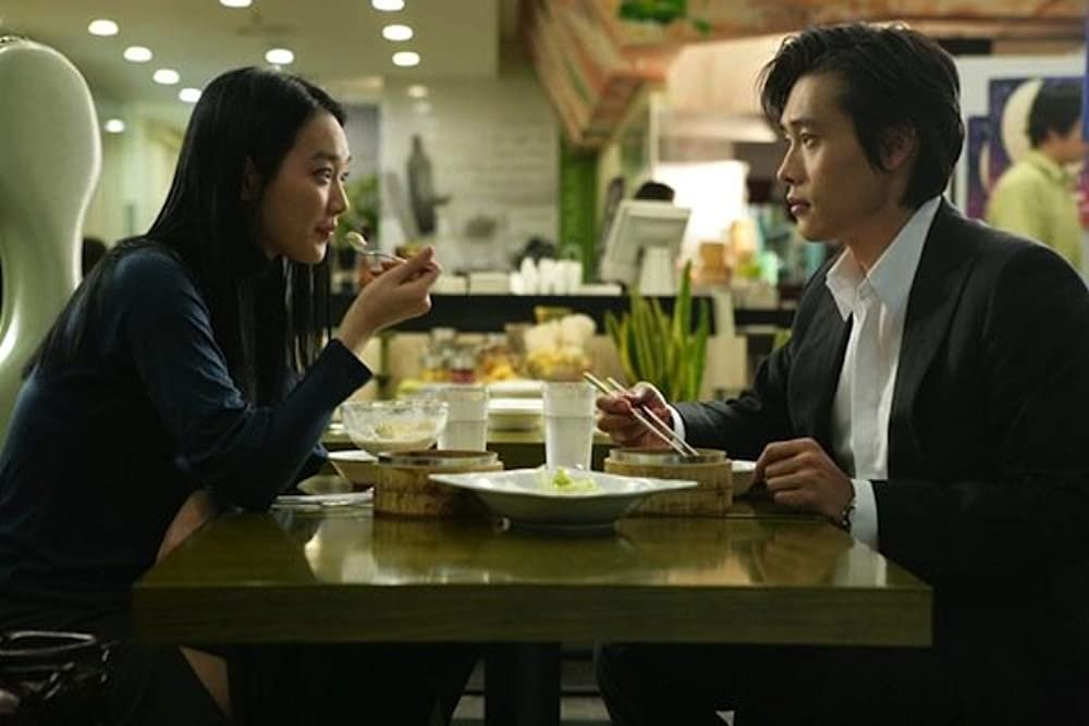 Shin Min-a and Lee Byung-hun in A Bittersweet Life