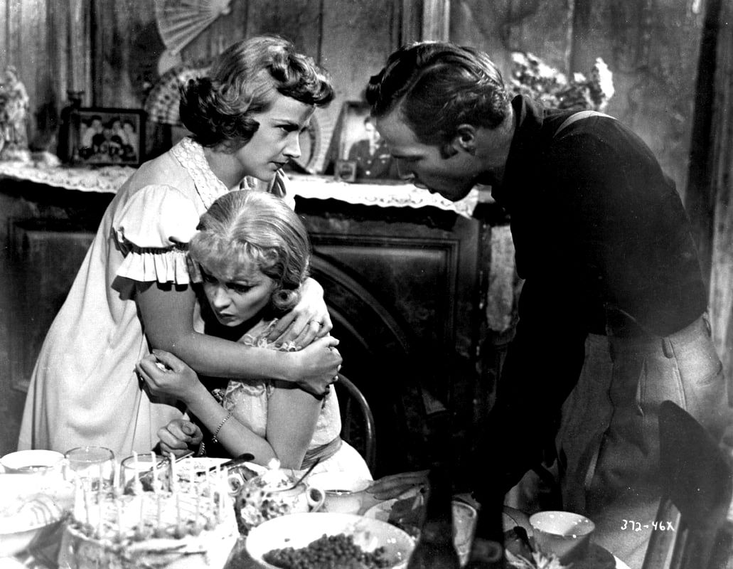 Still of Marlon Brando, Vivien Leigh, and Kim Hunter in A Streetcar Named Desire, 1951.