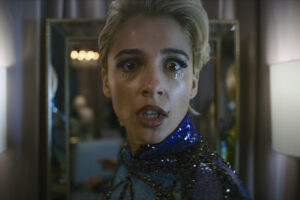 Smile 2 Review: A Mentally Induced Psychological Horror That Succeeds the Original Naomi Scott stars in Paramount Pictures Presents A Temple Hill Production A Parker Finn FIlm "SMILE 2"