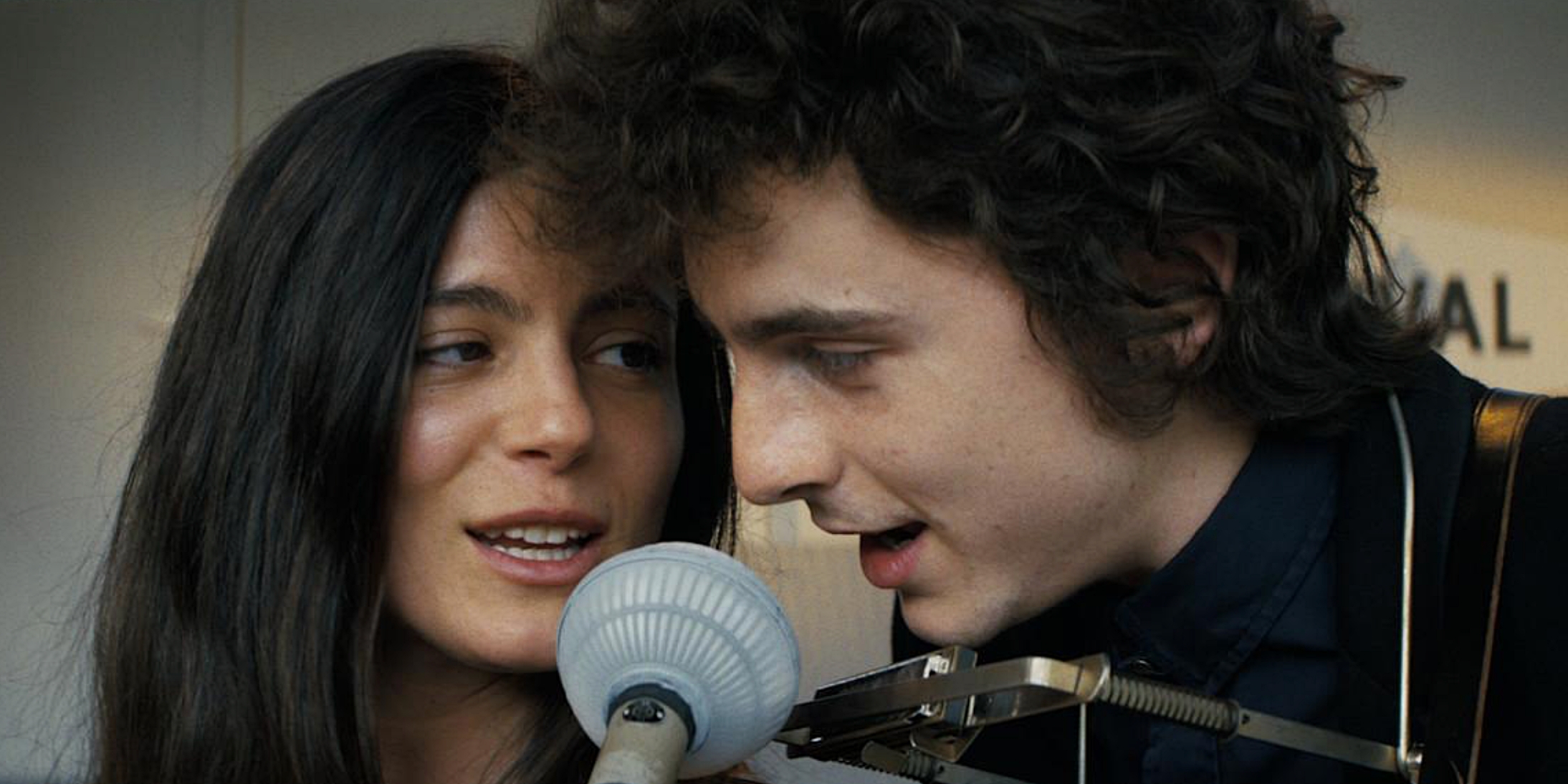 Timothee Chalamet and Monica Barbara as Bob Dylan and Joan Baez