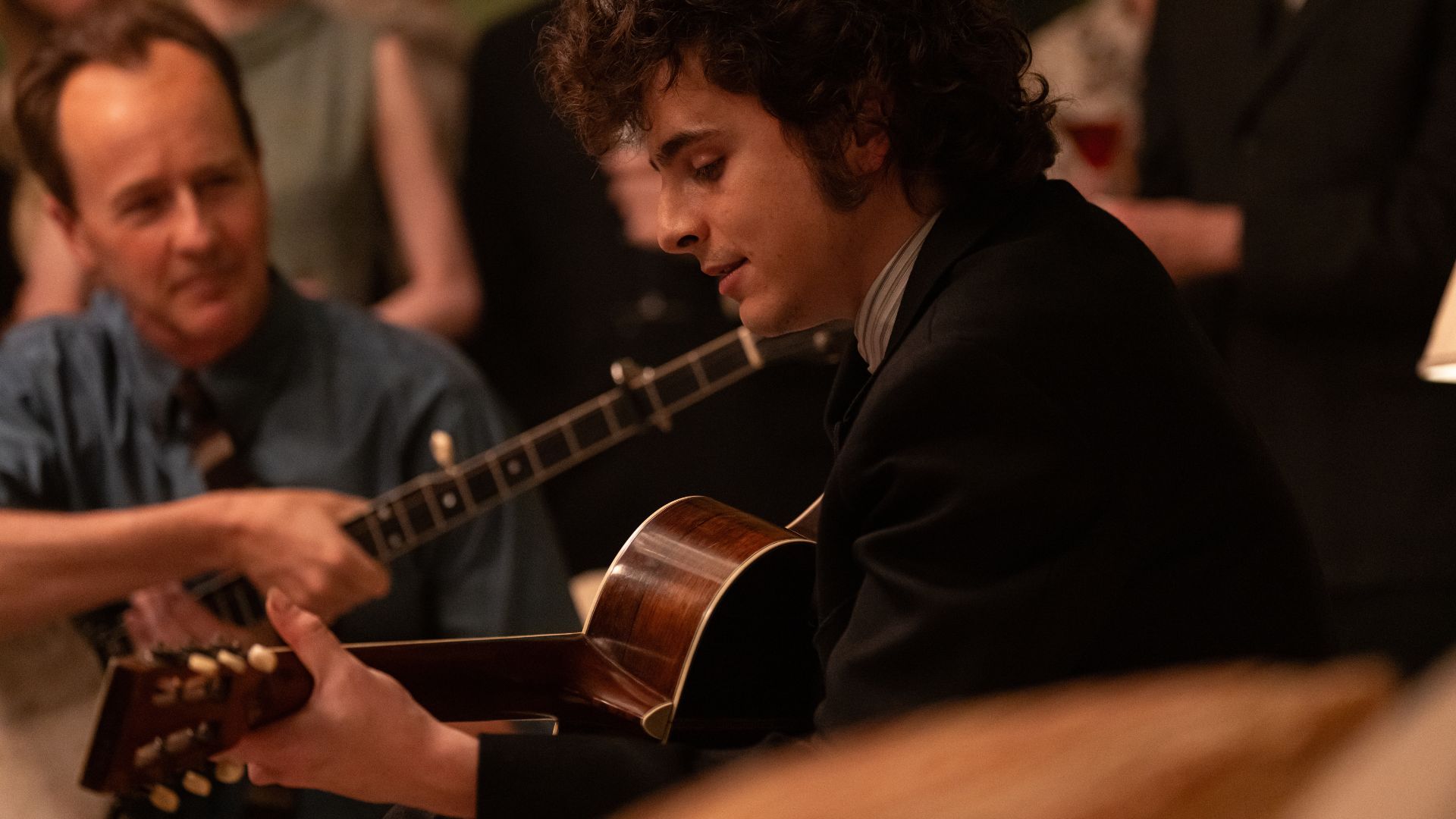 Timothee Chalamet and Edward Norton as Bob Dylan and Pete Seeger