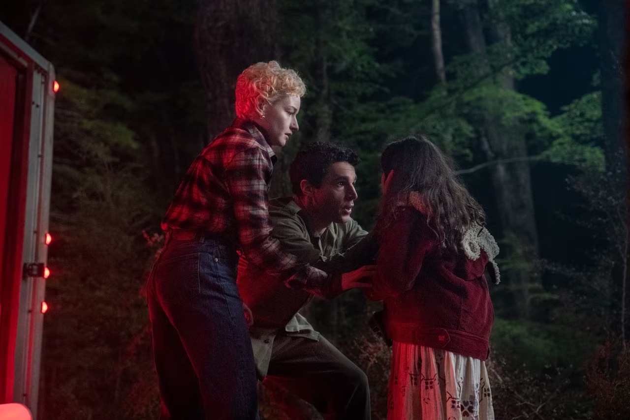 Julia Garner, Christopher Abbott, and Matilda Firth in Wolf Man