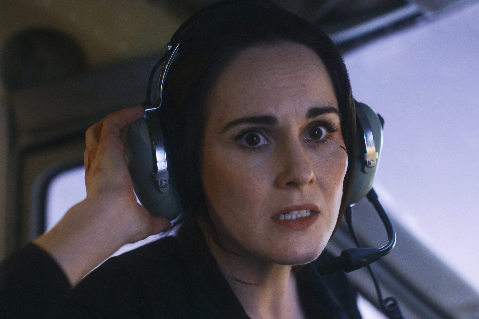 Michelle Dockery as Madolyn in Flight Risk