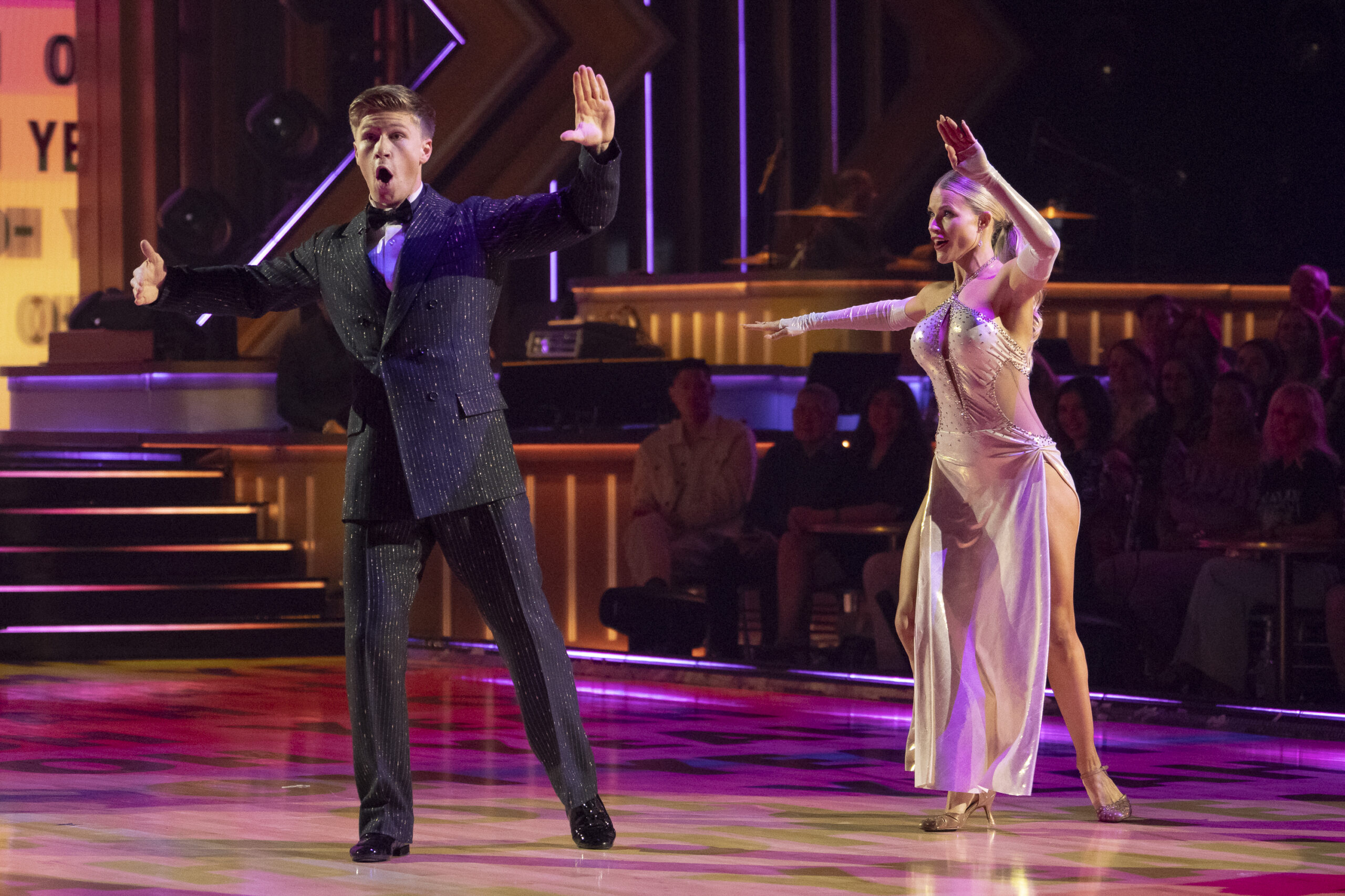Dancing With The Stars Season 34 Kicks Off With Surprising Performances But Unsurprising Eliminations Robert Irwin, wearing a formal tux and dance partner Witney Carson, perform a robotic bit during their tango routine on the DWTS ballroom floor