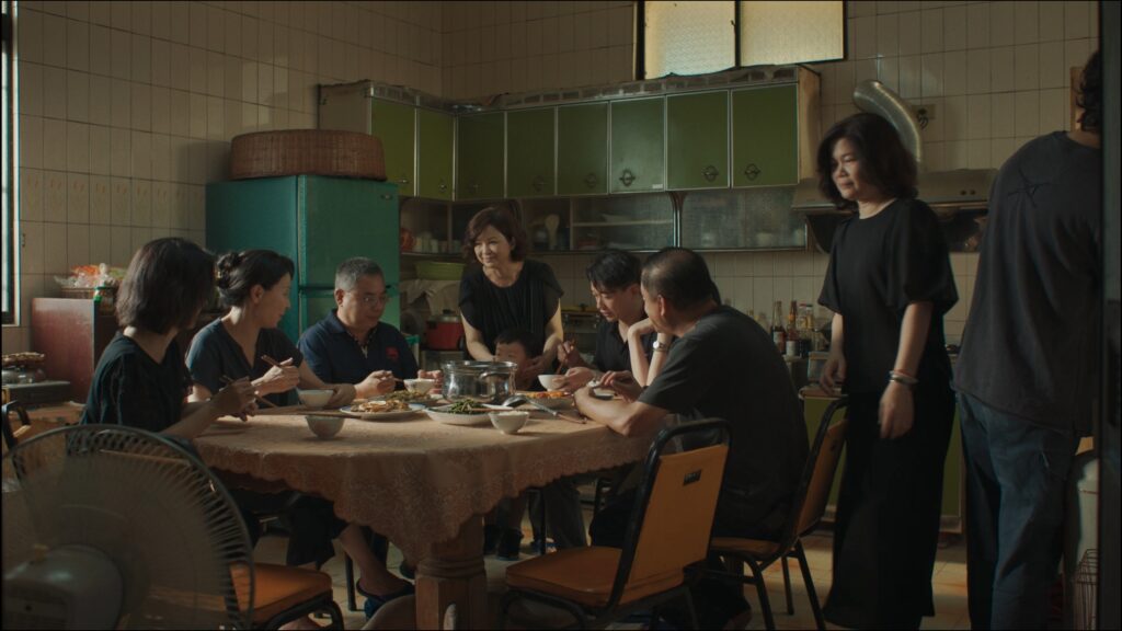 YuHan Tsai Discusses Her Short, DUA JI, Premiering at SXSW The siblings sitting around the kitchen table.