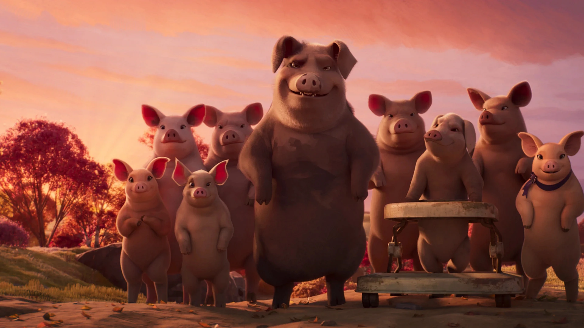 Animal Farm Review: George Orwell Fans May Be Underwhelmed by This Interesting Misfire Leader pig stands front and center with a tour of pigs outdoors at sunset; warm orange sky behind them.