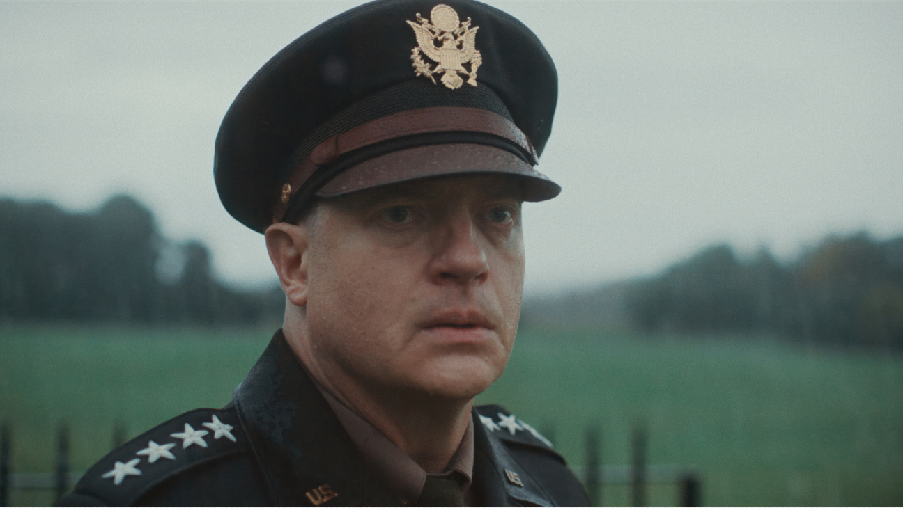 Pressure Review: Brendan Fraser and Andrew Scott are in Top Form for Powerful WWII Drama Close-up of a male U.S. Army officer in dress uniform outdoors on a gray day.