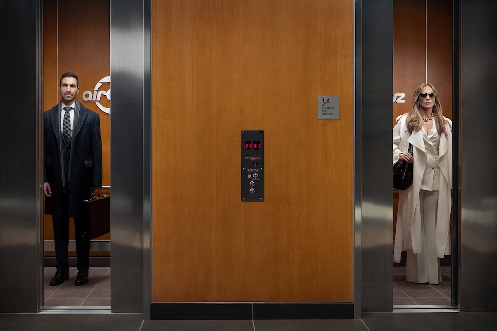 Office Romance Review: Jennifer Lopez Shines in This Perfectly Watchable Netflix Rom-Com Office Romance. (L-R) Brett Goldstein as Daniel Blanchflower and Jennifer Lopez as Jackie Cruz in Office Romance.