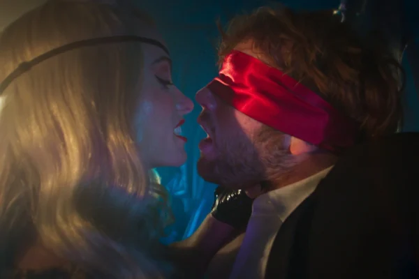 Olivia Wilde and Cooper Hoffman in I WANT YOUR SEX, a Magnolia Pictures release. Photo courtesy of Magnolia Pictures.
