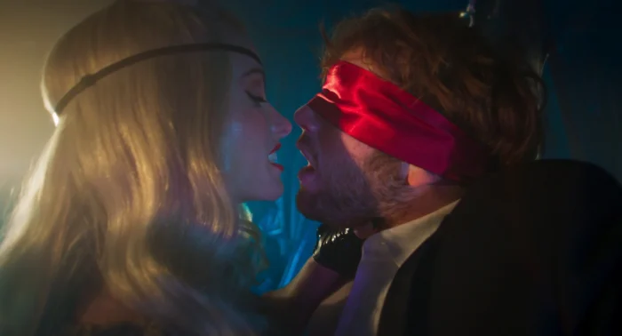 I Want Your Sex Review: Gregg Araki Makes Nuance Sexy Olivia Wilde and Cooper Hoffman in I WANT YOUR SEX, a Magnolia Pictures release. Photo courtesy of Magnolia Pictures.