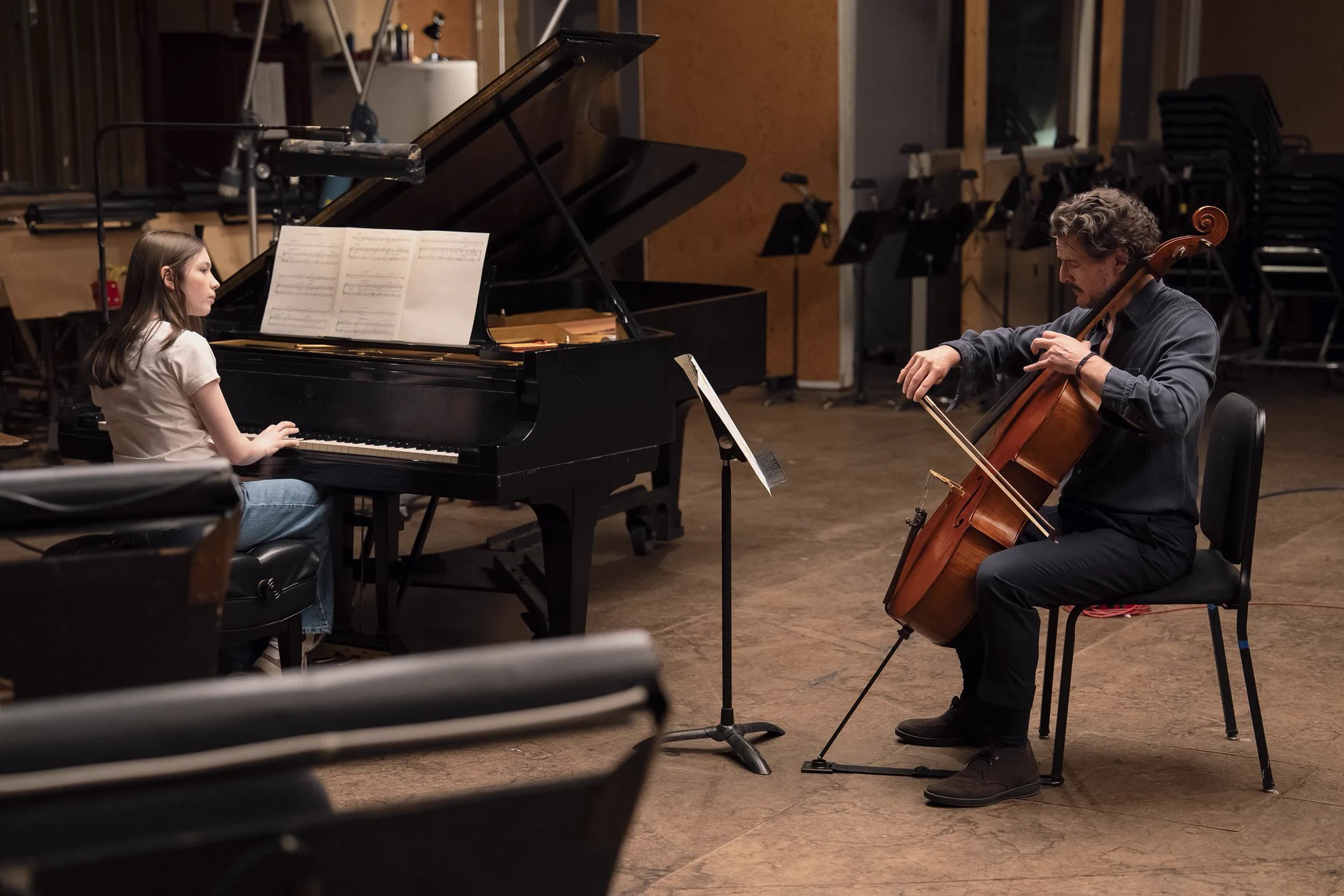 62nd Chicago International Film Festival Review: ‘Behemoth!’ Allows Pedro Pascal to Take Center Stage Alexa Swinton and Pedro Pascal in BEHEMOTH! - Courtesy of Searchlight Pictures
