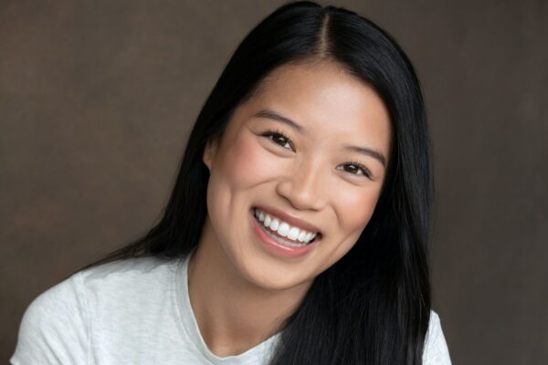 Kari Wong Talks All That She Wants—Interview Actress Kari Wong smiles while posing for a headshot